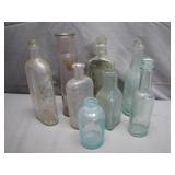 8 Glass Bottles in Assorted Shapes