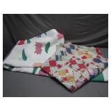 Two Handcrafted Quilts with Floral Patterns