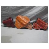 Three Leather Gun Holsters Three Leather Gun Holsters