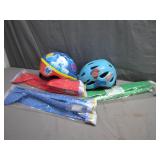 Two Kids� Helmets And Pool Noodles Two Kids� Helmets And Pool Noodles