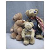 Charming Trio of Teddy Bears with Attire Charming Trio of Teddy Bears with Attire