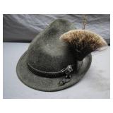 Traditional Green Hat With Feather Ornamentation