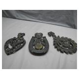 Three Decorative Cast Iron Trivets