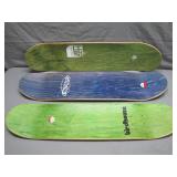 3 Skateboards With Distinct Graphics
