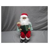 Santa Claus Figurine With Book and Bear