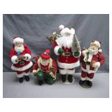 4 Collectible Holiday Santa Figurines