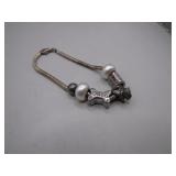 Sterling Silver Bracelet With Charming Charms