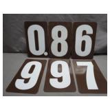Brown and White Number Sign Panels