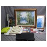Art Supplies With Framed Landscape Painting