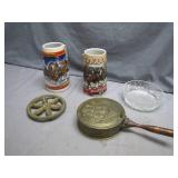 Decorative Lot: Steins, Trivet, and More