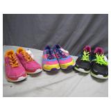 Three Pairs of Colorful Running Shoes