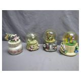 Four Musical and Decorative Snow Globes