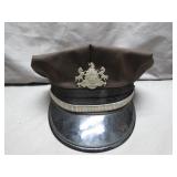 Brown Hat with Crest Emblem and Silver Trim