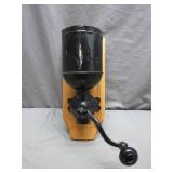 Iron Hand-Crank Coffee Grinder Mounted on Wood