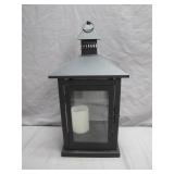 Metal Lantern With Candle and Glass Panels