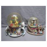Two Holiday-Themed Snow Globes