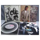 4 Iconic Vinyl Records