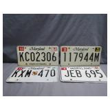 Four Maryland License Plates