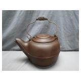 Cast Iron Teapot with Markings and Wire Handle