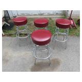 Four Chrome and Red Vinyl Bar Stools