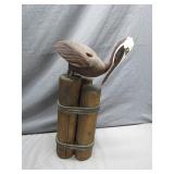 Wooden Pelican Sculpture on Buoys