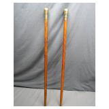 Carved Wooden Canes with Brass Tops