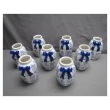 Eight Blue and White Bow Vases