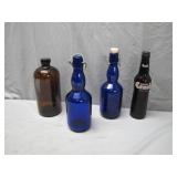 Four Vintage Glass Bottles