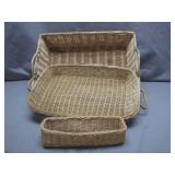 Three Woven Storage Baskets