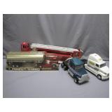 Four Toy Trucks With Detailed Features