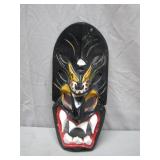 Hand-Carved Wooden Mask with Fierce Features