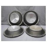Four American Motors Hubcaps
