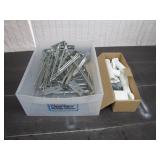 Metal Brackets and Plastic Pipe Fittings