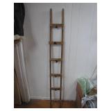 Wooden Ladder With Clips Attached