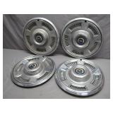 Four Chevrolet Hubcaps