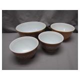 Four Pyrex Mixing Bowls with Floral Design