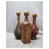 Three Leather-Covered Bottles