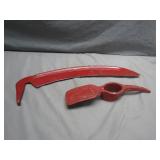 Two Red Cast Iron Tools