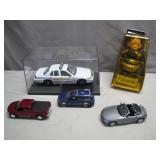 Collectible Die-Cast Cars and Policeman Figurine
