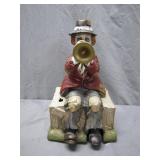 Figurine of Trumpet-Playing Clown on Crate