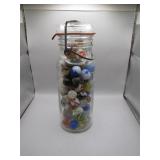 Glass Jar With Assorted Marbles