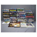 Mixed Collection of VHS Tapes and DVDs