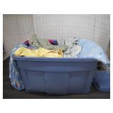 Blue Storage Bin Filled with Assorted Apparel