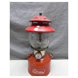 Red Coleman Lantern With Cracked Globe