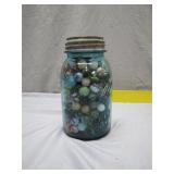 Glass Jar Filled With Multicolored Marbles