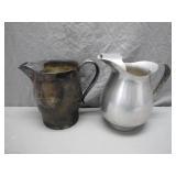Two Metal Pitchers, Distinctive Contrast