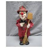 Plaid-Clad Clown Figurine with Straw Broom