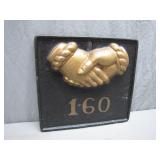 Cast Iron Plaque With Golden Handshake Design