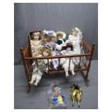 Porcelain Dolls in Wooden Cradle