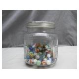 Glass Jar Filled With Colorful Marbles